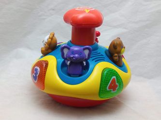 VTECH SPIN N LEARN TOP ***COMES WITH NEW BATTERIES***
