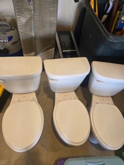 2 White Gerber toilets - like new - sold separately