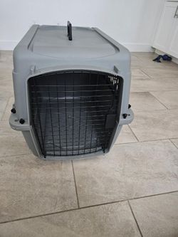 Plastic dog crate
