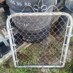 Chan link fence door.