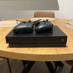 Xbox One X (1 TB) - Includes 2 Controllers & Cables