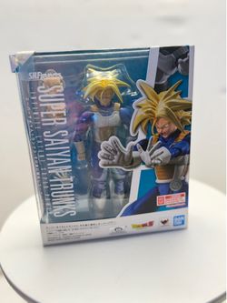 The image shows the collectible Super Saiyan Trunks -Infinite Latent Super Power- action figure from the S.H.Figuarts line by the renowned Japanese br