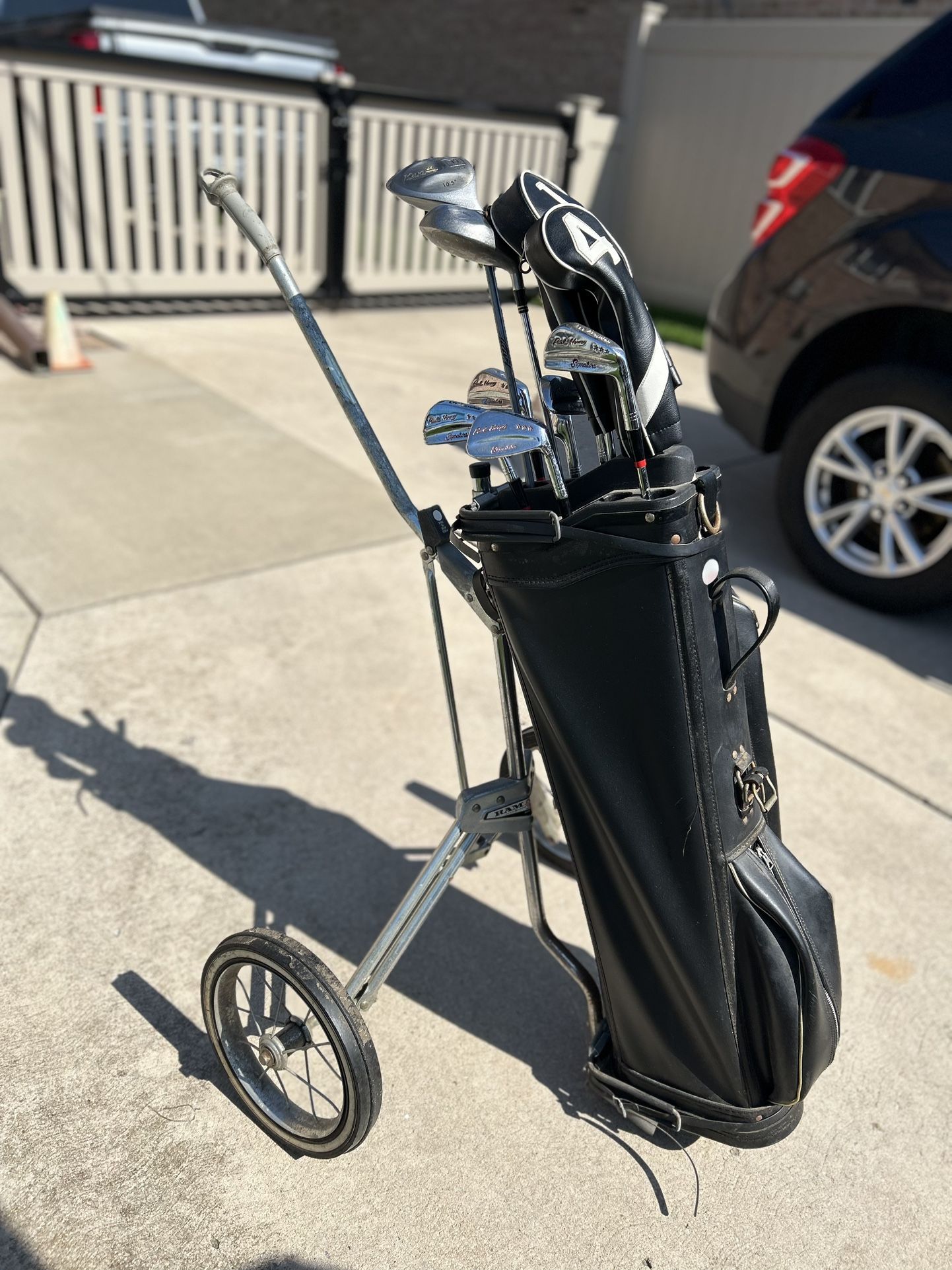 Vintage Golf Cart with 11 golf clubs