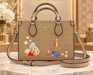 Coach x Disney Winnie the Pooh Signature Leather Handbag