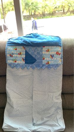 Hand made hanging diaper holder (fish themed)