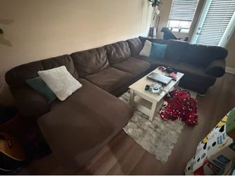 Large comfy couch, TV stand, 43 inch Element TV, 2 smaller couches,  2 large VESL paddle boards