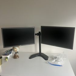 Two Dell Computer Monitors and Stand