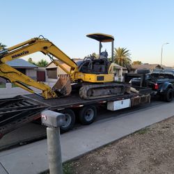 Excavator Srvce Does It All. 