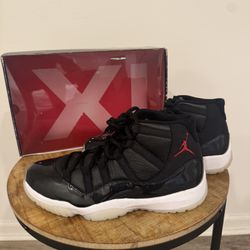 2015 Jordan 11 (Sz 11.5)- 72-10 Blk/ Red / White