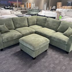 Green L Shaped Sectional And Ottoman 
