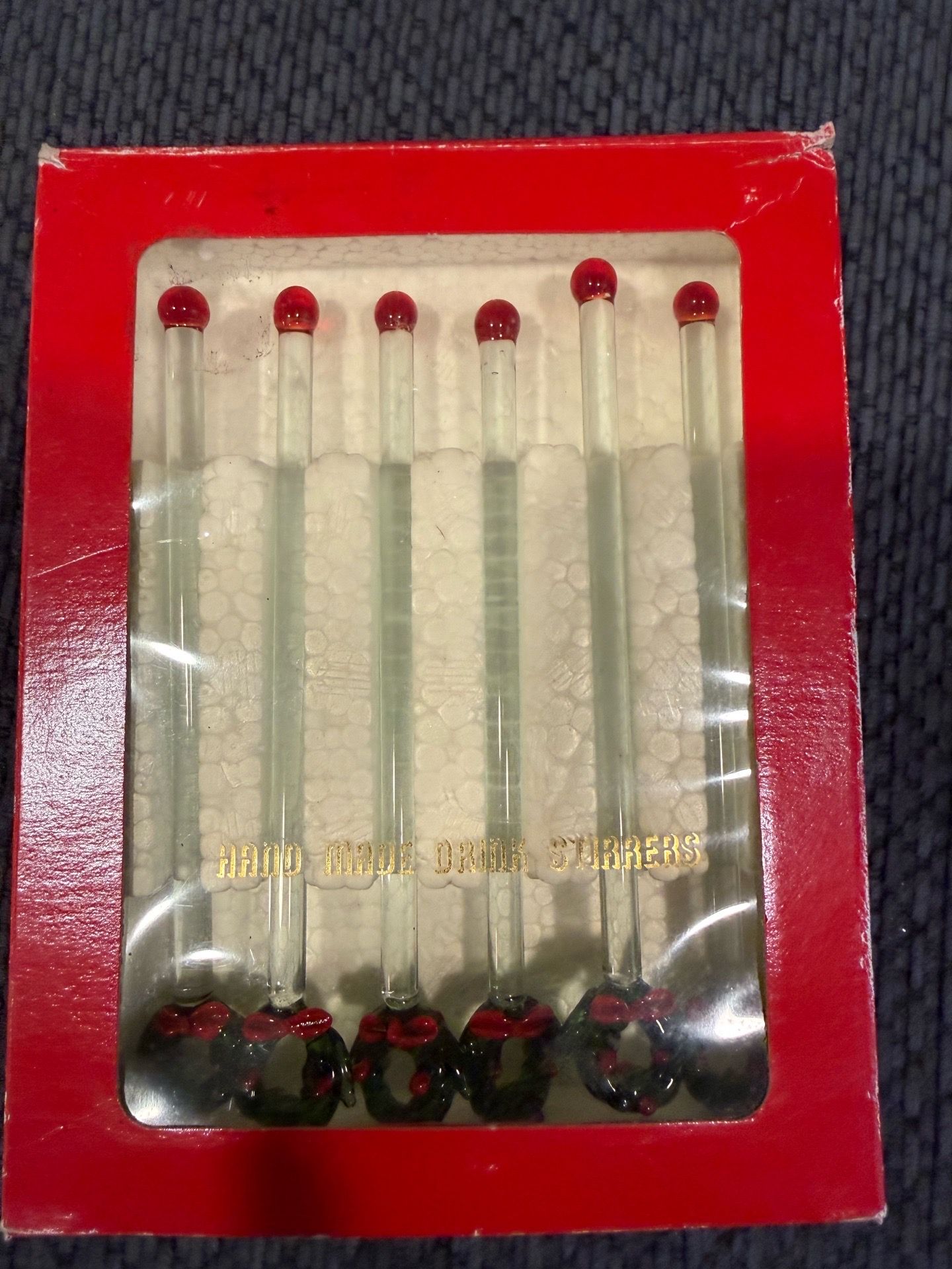 Vintage handmade holiday drink stirrers with red and green wreath designs on top- 6 count
