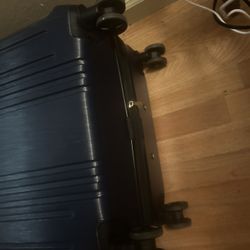 Large suitcase, navy blue with lock and wheel wheels