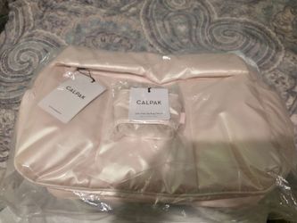 Calpak Luka Tote in Pealescent color with matching mini tote keychain