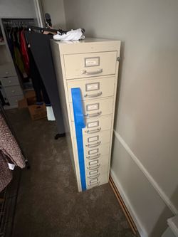Vintage tall metal file cabinet