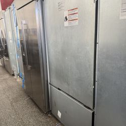 New JennAir RISE 36 Inch Stove/Range with Griddle and JennAir 36 inch Panel Ready Refrigerator Set