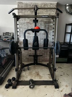 Nautilus Smith Machine with weights.