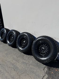 KMC KM552 IMS 6x5.5 17" Black Wheels With New 33” Mickey Thompson Baja Boss All-Terrain Tires
