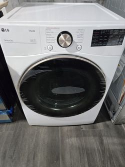 Brand New - LG FRONT LOAD STEAM ELECTRIC DRYER IN WHITE 