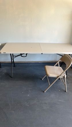 Folding table with 6 metal chairs