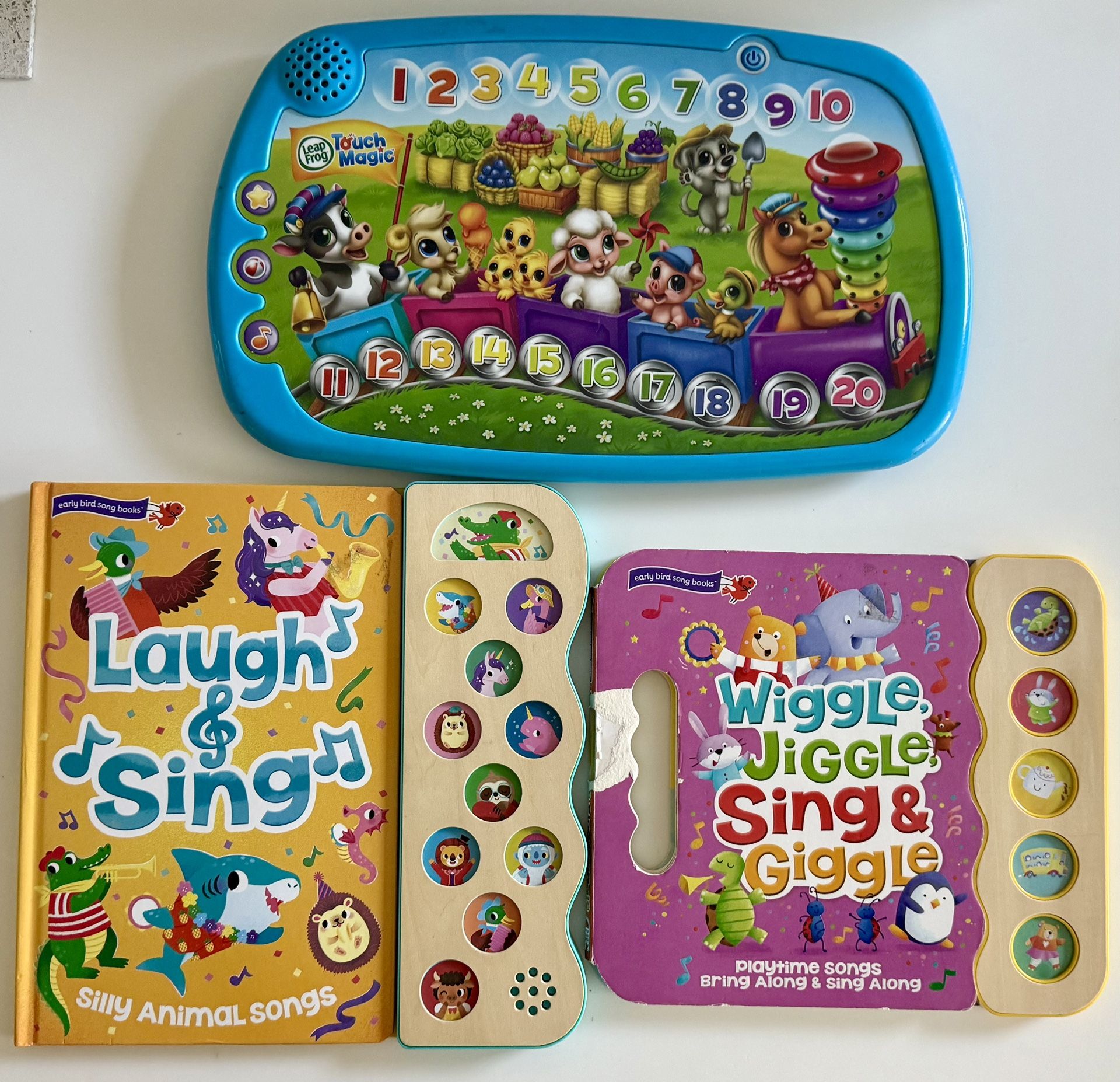 Baby Toddler Games and Books with Noise, batteries may need to be updated, handle on purple book is ripped but inside isn’t impacted