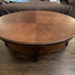 48 inch Oval Cherry Wood Coffee Table with shelf