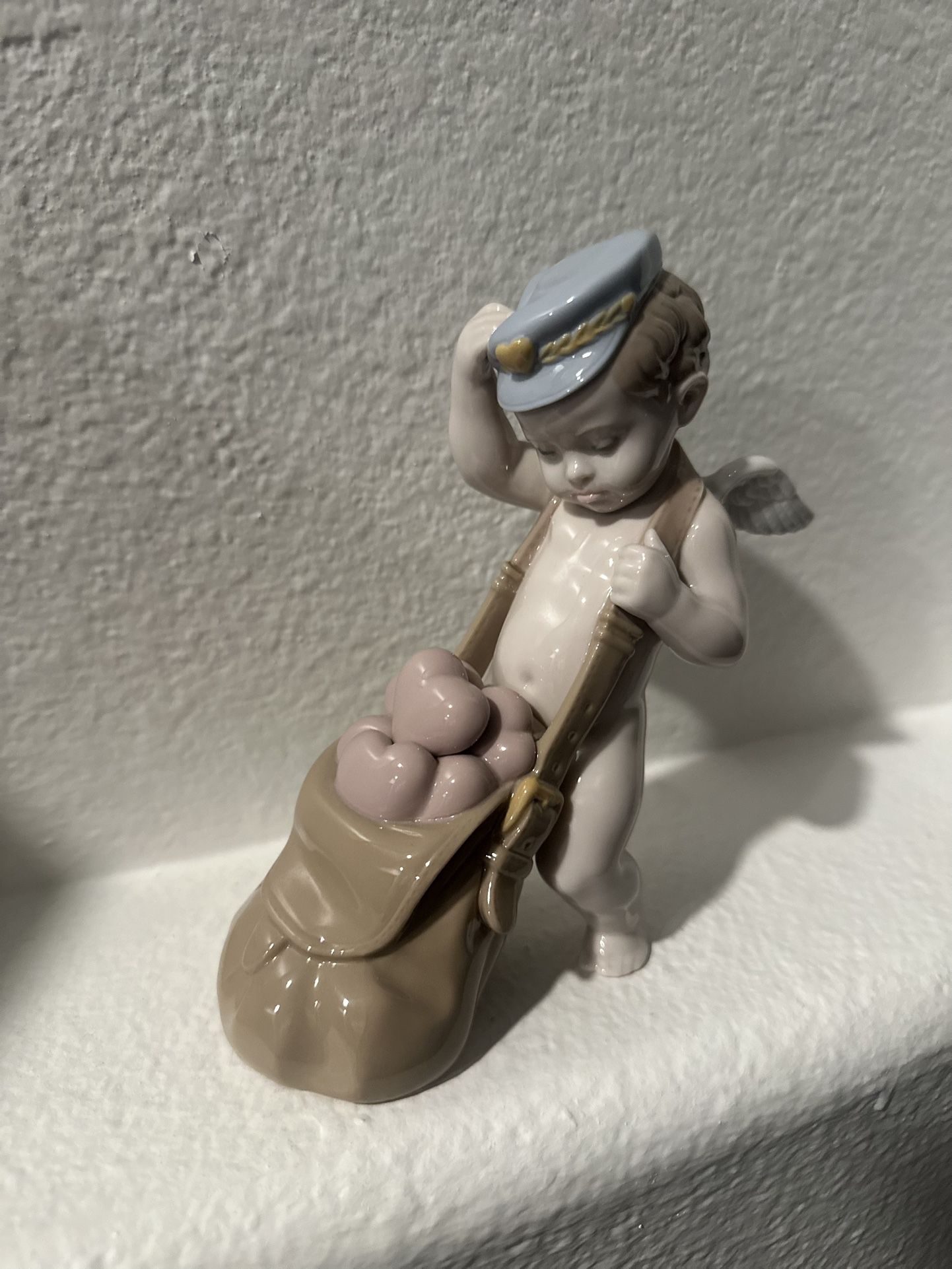 Lladro Love Letters Cupid figurine