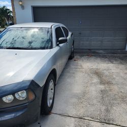 2007 Dodge Charger and 2011 GL 450 Benz