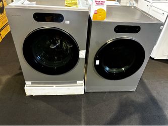 Brand new LG signature 5.8 cuft washer and 9cuft dryer set with all LG warranties