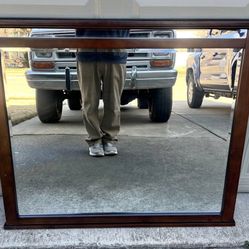 Nice beveled mirror in wood frame