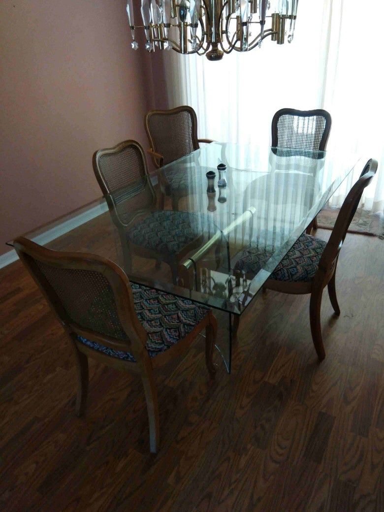 Kane back Glass Top Dining Room Table With Upholstered Chairs