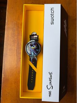 NEW/NIB Swatch x The Simpsons "AYE CARUMBOO!" (SB01Z105)