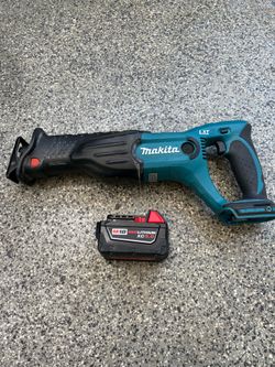 Makita Saw and Milwaukee battery combo !!