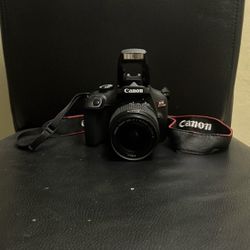 Canon Rebel T-100 DSLR Camera w/ Tripod and Assorted Accessories