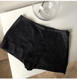 Express lace and leather shorts