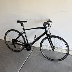 Specialized Sirrus 1.0 bike size large and helmet