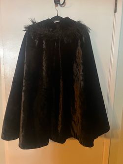 Black velvet silk plush cape with fur collar trim.