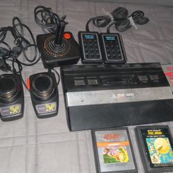 Atari game with controllers. The only thing is I don't have the power cord.