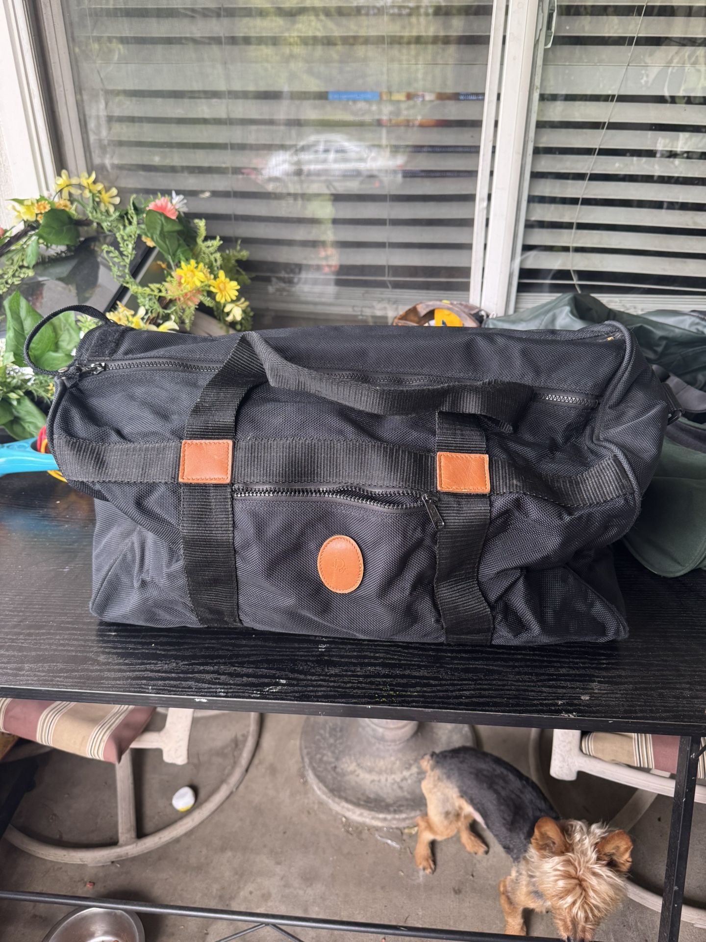 Christian Dior black canvas Duffle Bag Vintage leather handles 80's retro