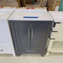 24 in Single Sink Bath Vanity in Black with Vanity Top in White  $349 