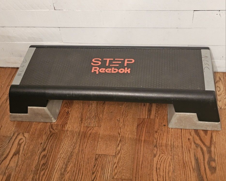 Step Reebok 6", plus 4" with the raiser (10" total height)... $50