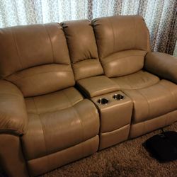 Almost New Leather Console  Electric  Recliners