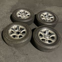 4 - 265/65r17 6x5.5 6x139.7 Toyota Tacoma Stock Wheels Rims With Good Dunlop 80% Treads Tires!!