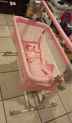 Pink baby crib