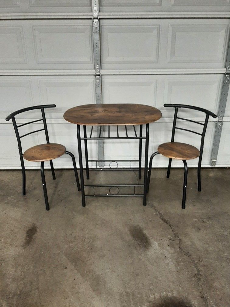 Wood And Metal Dining Table And Two Chairs