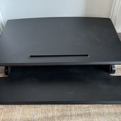 Desk riser / sit-stand converter