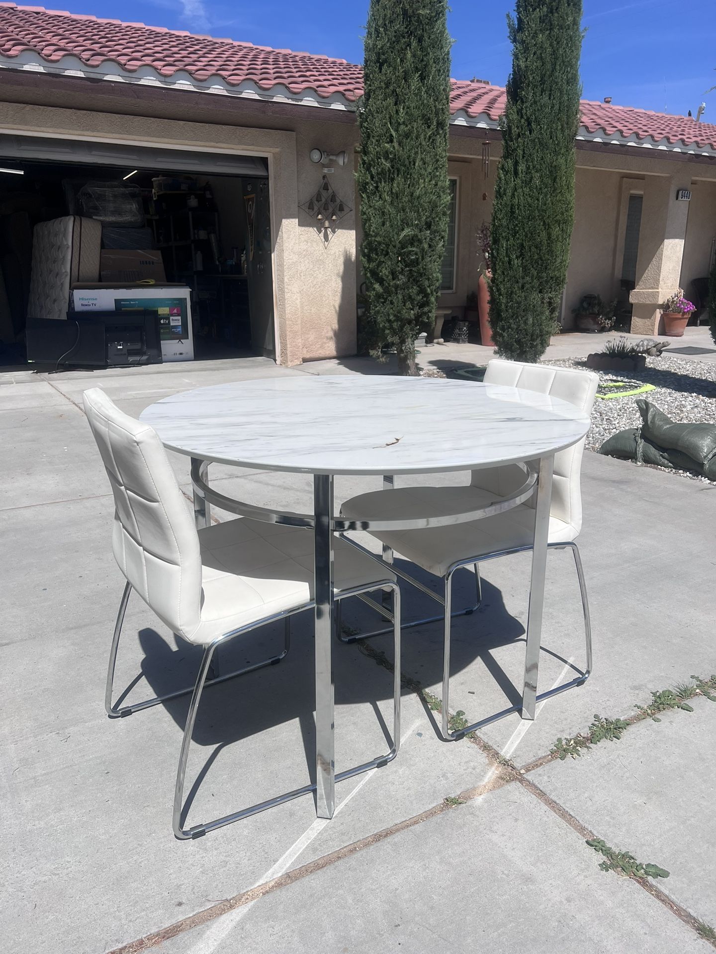 Dining Table W/ Two Chairs’!