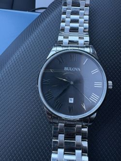 Authentic Black Faced Men’s Bulova Watch.