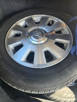 Mercury tires and factory rims