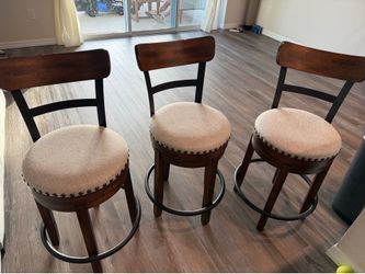 3  counter chairs. (Ashley)