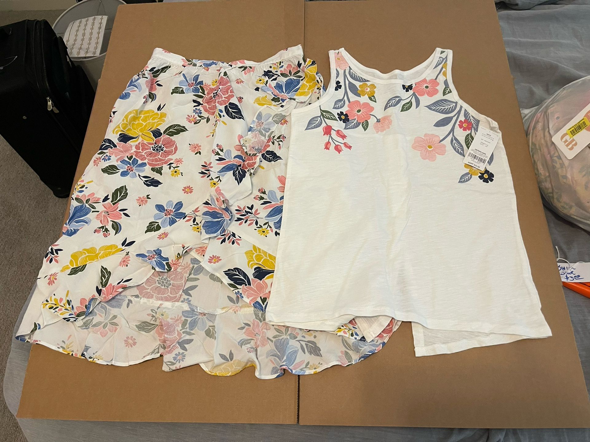 Carter’s girls size 8 floral sleeveless top and matching skirt. New with tags. 